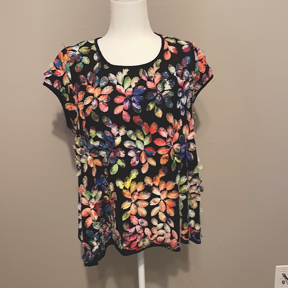 Karen Kane floral top to add flair to your next outfit